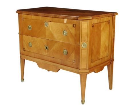 An early 19th century Swiss cherry and satinbirch commode, the moulded edge top crossbanded and quarter veneered and inlaid w