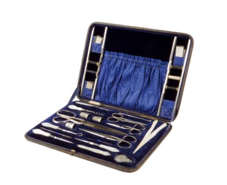 λ A late Victorian black leather sewing box by Mappin & Webb, the plush lined and silk interior with a pouch and needle compa