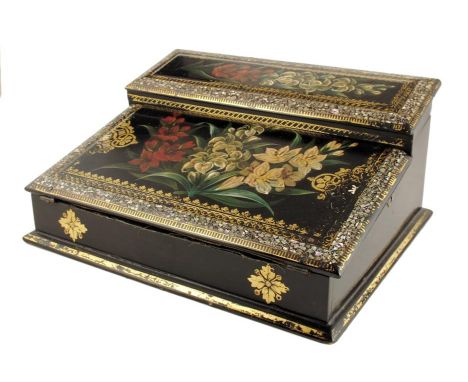 A 19th century French papier-mâché writing slope, with mother of pearl inlaid borders, gilt highlights and painted floral spr