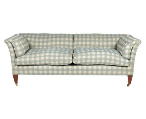 A 'Bunny' sofa by Christopher Hodsoll, with scroll ends, upholstered in check fabric on stained beechwood supports and brass 