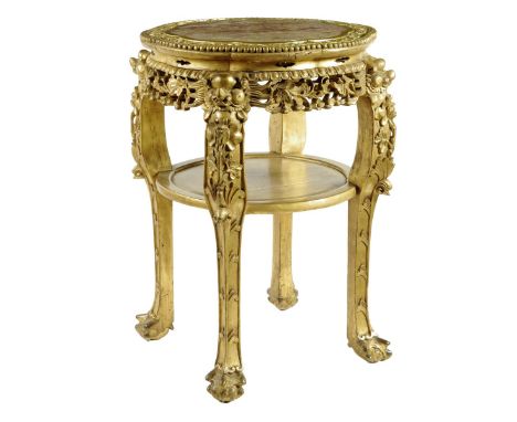 A Chinese giltwood jardinière stand, the lobed top inset with marble with a leaf carved surround and a leaf and berry pierced