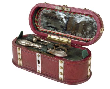 λ A mid 19th century red leather and ivory mounted étui, the hinged lid with an agate cabochon, the interior with a mirror to