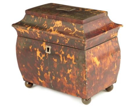 &lambda; A Regency tortoiseshell pagoda shape tea caddy, inlaid pewter stringing the hinged lid with a white metal plaque ins