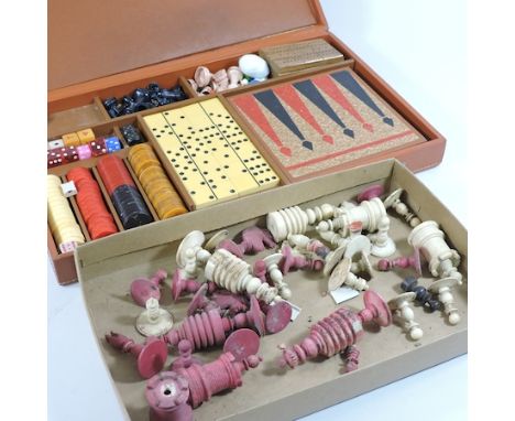 A 19th century bone part chess set, together with a 20th century games compendium, cased, 41cm