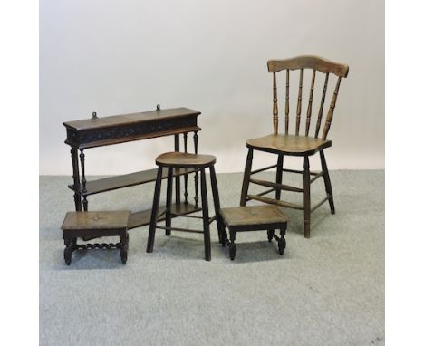 A pair of 19th century oak footstools, together with a shelf, 71cm, a spindle back chair and a stool (5)