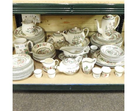 A shelf of Indian Tree pattern tea and dinner wares