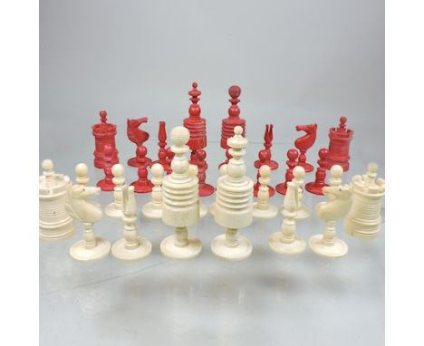 A 19th century carved bone chess set, highest piece 10cm