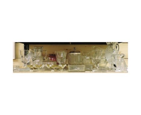 A shelf of 19th century and later glassware, to include vases, coloured glass and a flycatcher