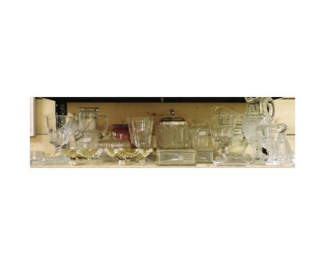 A shelf of 19th century and later glassware, to include vases, coloured glass and a flycatcher