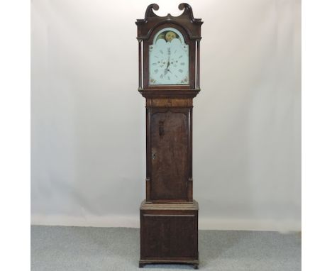 A 19th century oak cased longcase clock, with a painted dial and moon phase, 222cm high