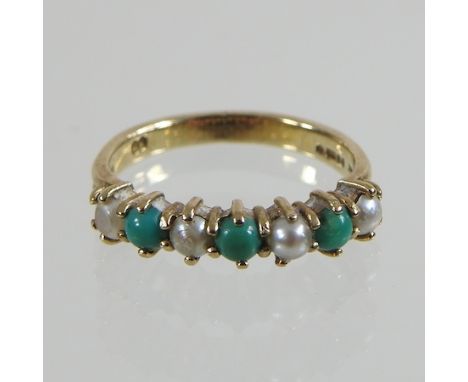 A 9 carat gold turquoise and pearl seven stone ring