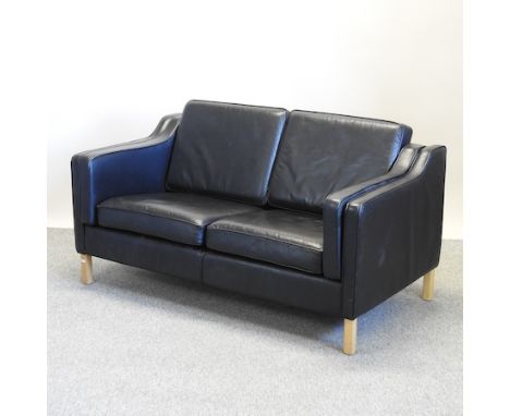 A modern Danish style black upholstered sofa, on square legs, 154cm