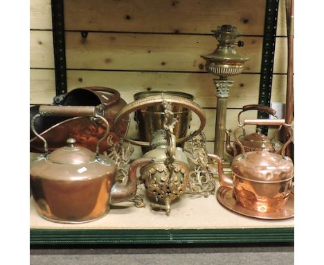 A collection of mainly 19th century copper and brass wares, to include a Corinthian column oil lamp, a coal scuttle, hunting 