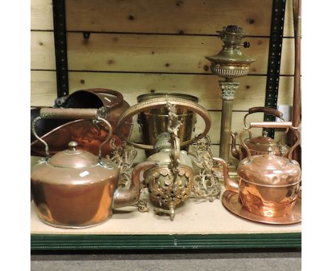 A collection of mainly 19th century copper and brass wares, to include a Corinthian column oil lamp, a coal scuttle, hunting 