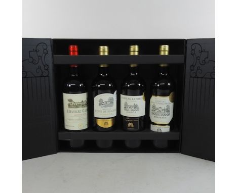 A limited edition set of four bottles of Bordeaux wine, gold medal selection 2015, in a presentation box