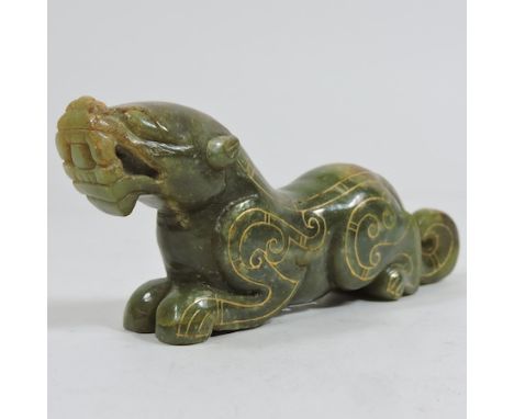 A jade coloured model of a beast, 12cm long