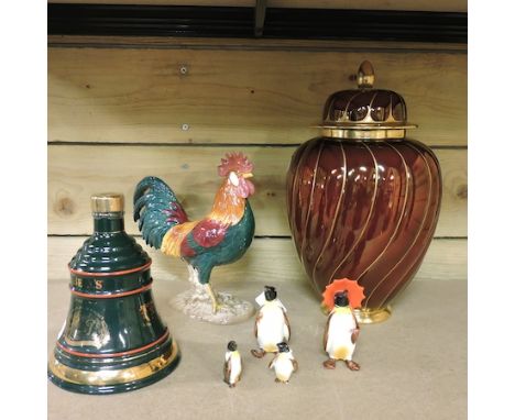 A Beswick pottery cockerel, 24cm high, together with four graduated Beswick penguins, a Bells Christmas 1992 Old Scotch Whisk