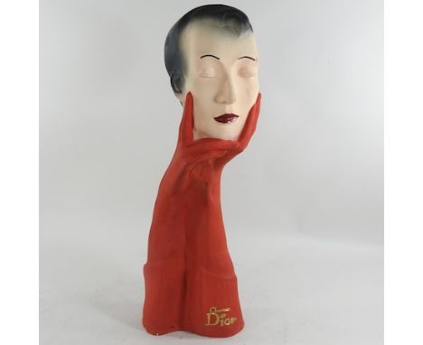 A Christian Dior painted plaster advertising figure, 56cm high