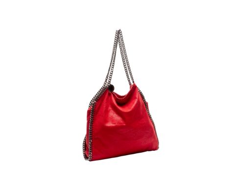 A STELLA MCCARTNEY FALABELLA CHAINED TOTE BAG
Red vegan leather with silver tone chain, magnetic closure, with brand dust bag