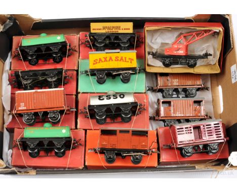 Hornby O Gauge group of post-war Goods Wagons consisting of No.50 Saxa Salt, Cattle Truck, No.1 Manchester Oil Refinery Tanke