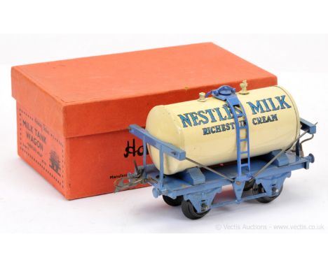 Hornby O Gauge "Nestles" Milk Tanker, version with blue base.  Some light wear otherwise Excellent in Excellent box.
