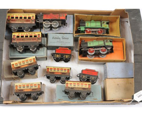 Hornby O Gauge group of MO/M1/2 Locos, Passenger and Goods Rolling Stock consisting of a M0 0-4-0 Loco and Tender red No.6161