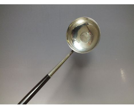 A HALLMARKED SILVER WHALE BONE HANDLED TODDY LADLE WITH INSET COIN TO BOWL - GLASGOW 1825, L 43 cm