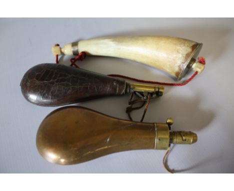 A 19TH CENTURY POWDER HORN, L 26 cm, together with a 19th century leather powder flask, L 22 cm and a 19th century brass shot