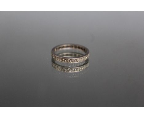 A FULL DIAMOND ETERNITY RING, set with brilliant cut diamonds of an estimated 0.60 carat, ring size O