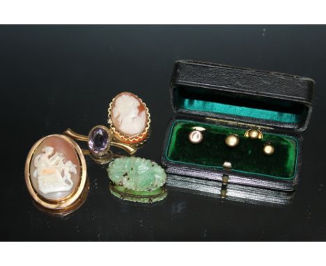 A 9CT MOUNTED CAMEO BROOCH, together with a 9ct mounted Jade brooch a/f, a 9ct amethyst brooch a/f and a small 9 carat gold m