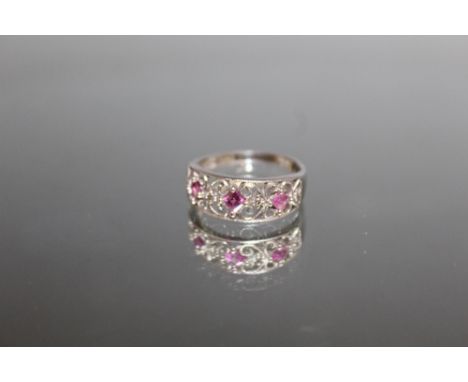 A 9 CARAT WHITE GOLD PINK SAPPHIRE AND DIAMOND RING, ring size O