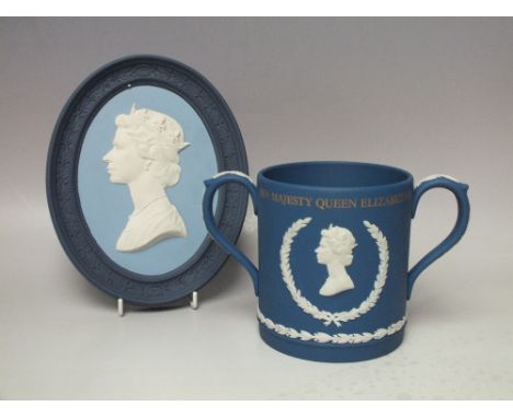 A WEDGWOOD BLUE BASALT OVAL WALL PLAQUE DEPICTING A PORTRAIT OF H.M.QUEEN ELIZABETH II, impressed marks to reverse, H 22.5 cm