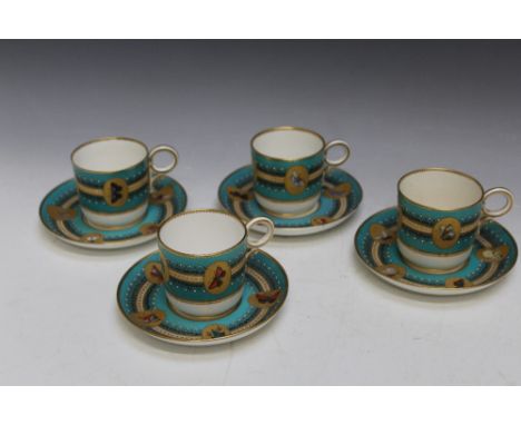 A SET OF FOUR JEWELLED CUPS AND SAUCERS, with indistinct mark to the saucers that appears to be Royal Worcester, each hand pa