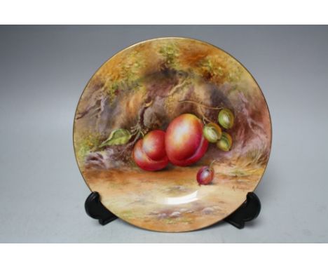 A ROYAL WORCESTER CABINET PLATE BY R. RUSHTON, decorated with fruit to a mossy background, Dia. 18 cm