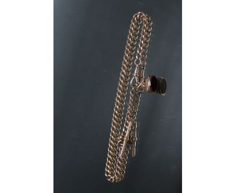 A HALLMARKED 9 CARAT GOLD CHAIN, with fob seal and T bar, approx combined weight 40.2g