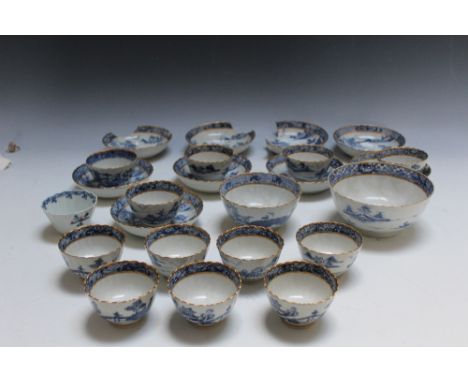 TWENTY FOUR PIECES OF ORIENTAL STYLE BLUE AND WHITE CHINA, consisting of twelve tea bowls and another, nine saucers and two b