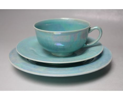 AN EARLY 20TH CENTURY RUSKIN TURQUOISE CRYSTALLINE GLAZED TRIO, comprising tea cup, saucer and side plate, impressed marks, p