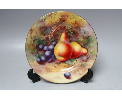 A ROYAL WORCESTER CABINET PLATE BY E. TOWNSEND, decorated with fruit to a mossy background, Dia. 18.5 cm