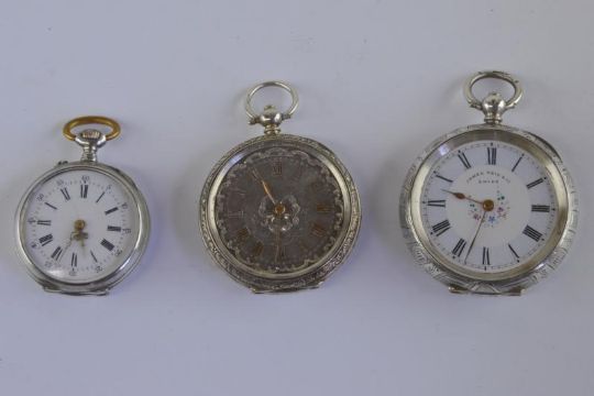 small silver pocket watch