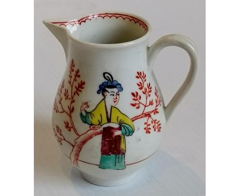 A Worcester baluster sparrow-beak cream jug with grooved loop handle painted in polychrome enamels and Oriental figures in a 