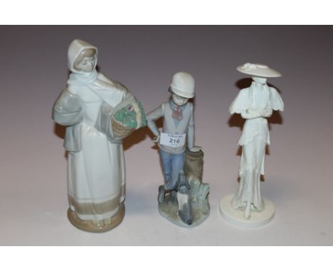 A NAO FIGURE OF A BOY AND A DOG, TOGETHER WITH A COALPORT 'HIGH SOCIETY' FIGURE AND ANOTHER