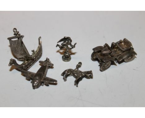 FIVE SILVER & WHITE METAL CHARMS TO INC A VINTAGE CAR