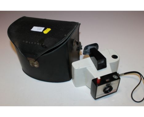 A VINTAGE POLARIOD CAMERA