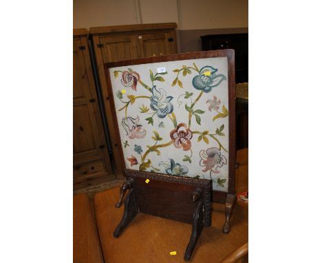 A GLAZED FIRE SCREEN AND OAK CLOCK BRACKET