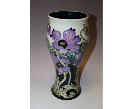 A LARGE MOORCROFT TRIAL FLORAL PATTERNED VASE 