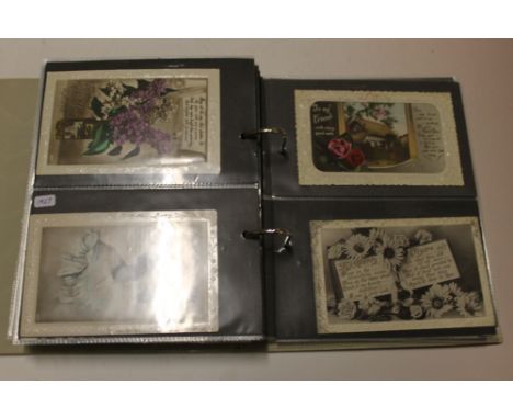 AN ALBUM OF VINTAGE POSTCARDS