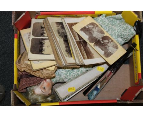 A TRAY OF COLLECTABLES TO INCLUDE SILK FANS, VINTAGE POSTCARDS AND A PORCELAIN DOLL
