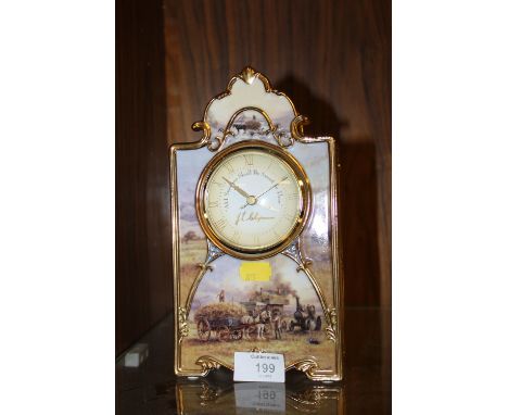 A GILT 'GOLDEN HARVEST' MANTLE CLOCK