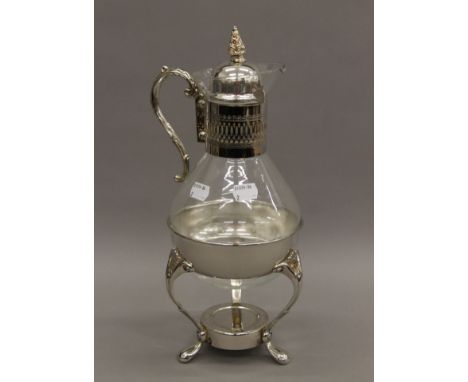 A vintage coffee pot on stand. 36 cm high.