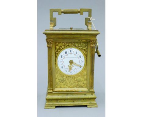 A large Victorian brass cased repeating carriage clock. 18 cm high.